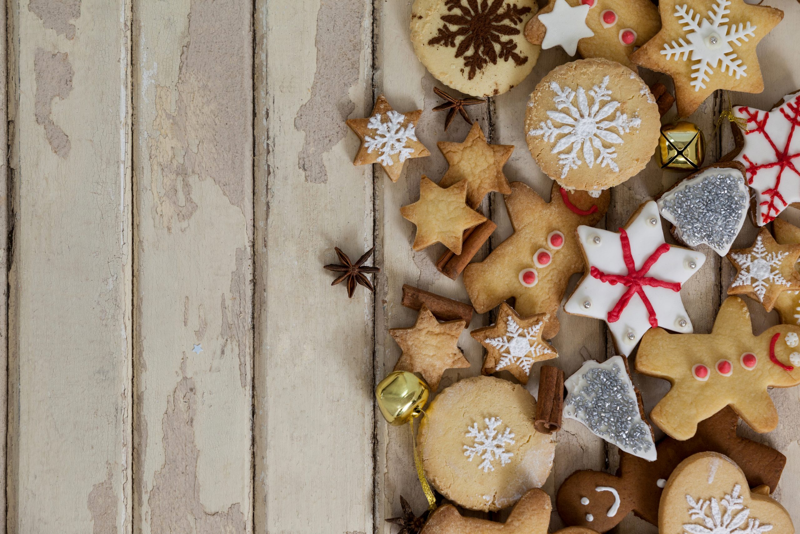 Various types of christmas cookies on a plank
