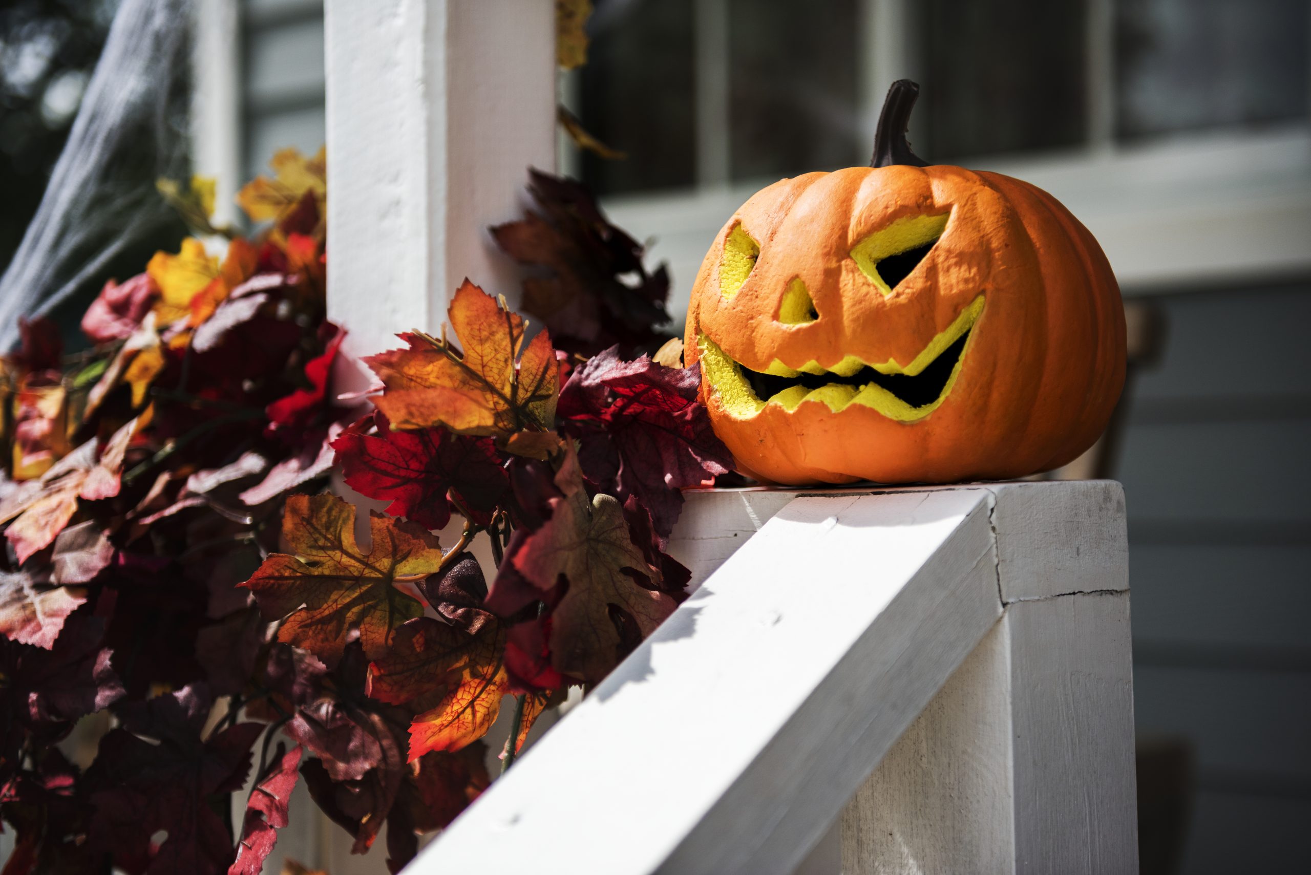 Halloween pumpkins and decorations outside a house Halloween pumpkins and decorations outside a house