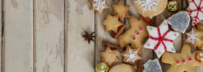 Various types of christmas cookies on a plank