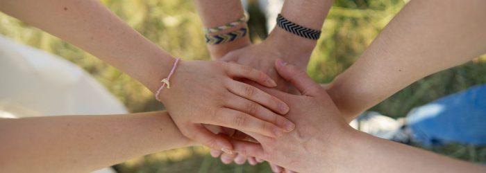 high-angle-hand-gestures-representing-friendship