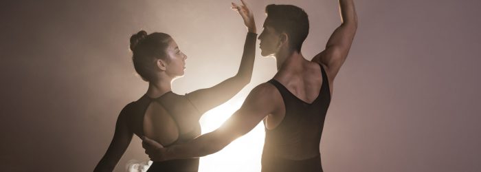 medium-shot-couple-performing-together